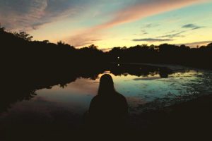 girl sitting alone