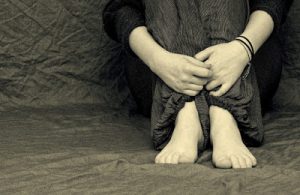 depressed girl sitting