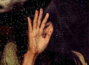 sad girl alone in rain