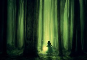 small girl walking in the forest