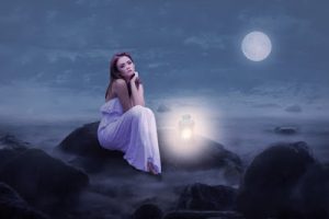 woman sitting alone