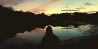 girl sitting alone